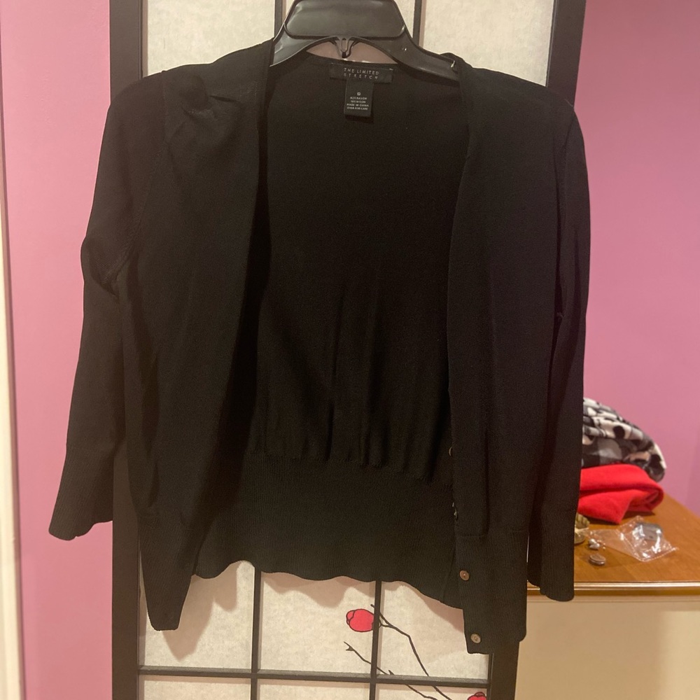 The limited black cardigan